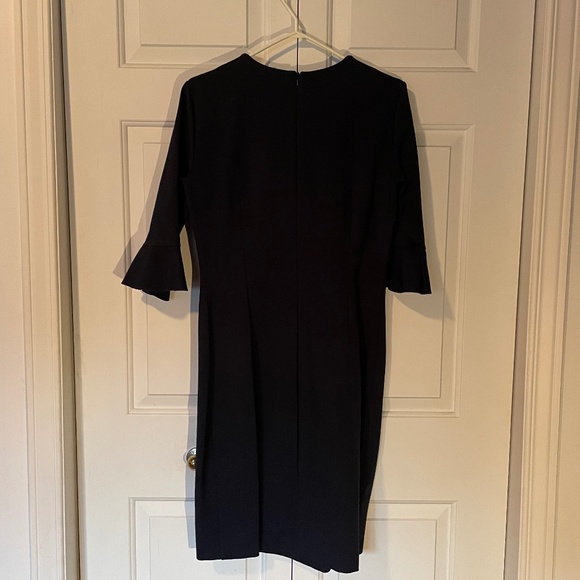 Navy work dress with circular flounce sleeve. - Picture 2 of 2